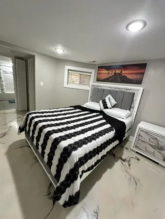 a bedroom with a bed and closet