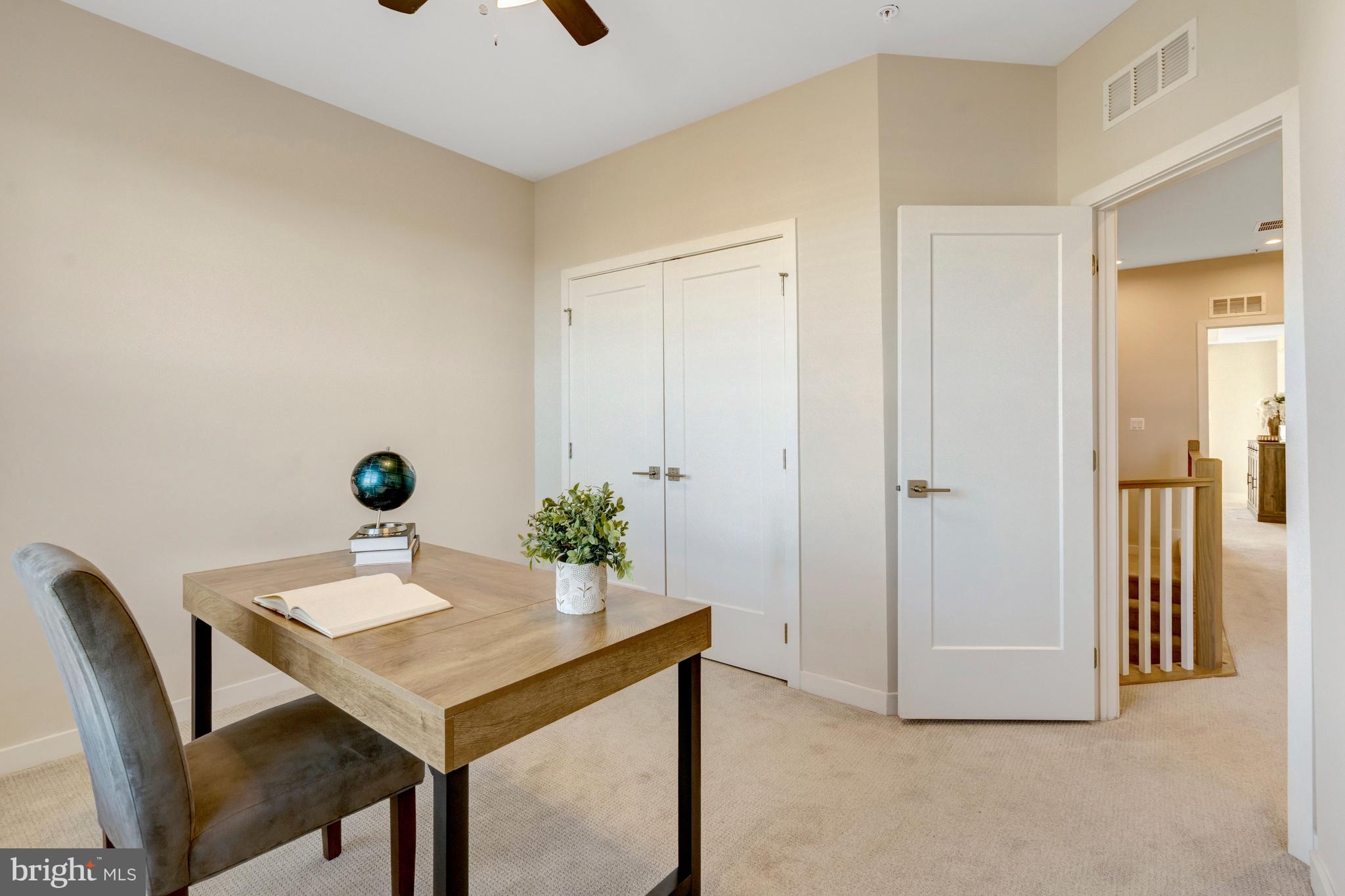 22379 Roanoke Rise Terrace Ashburn, VA 20148 - Photo 17 of 40 a view of a room that has a table and chairs in it