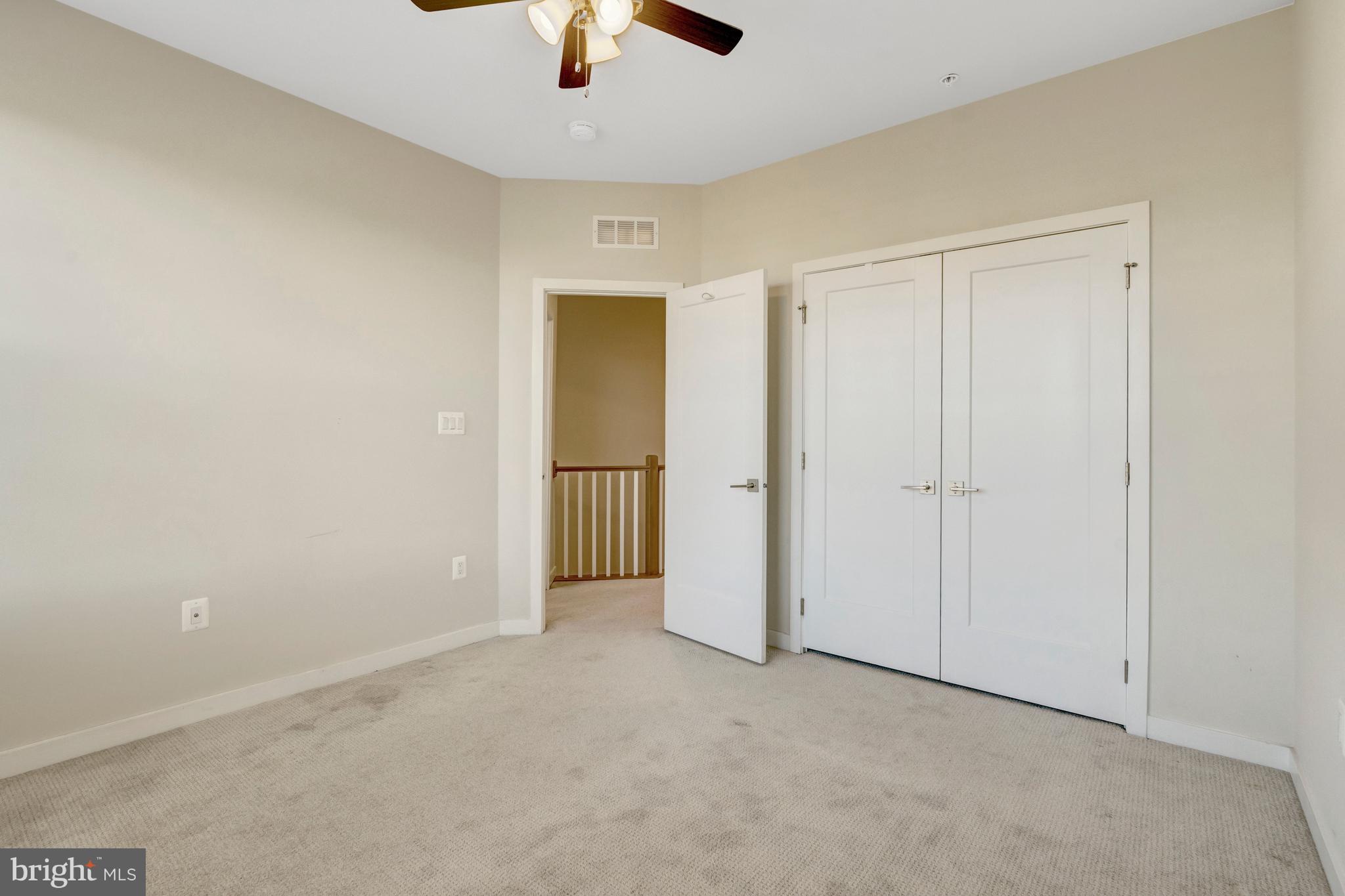 22379 Roanoke Rise Terrace Ashburn, VA 20148 - Photo 19 of 40 an empty room with closet area