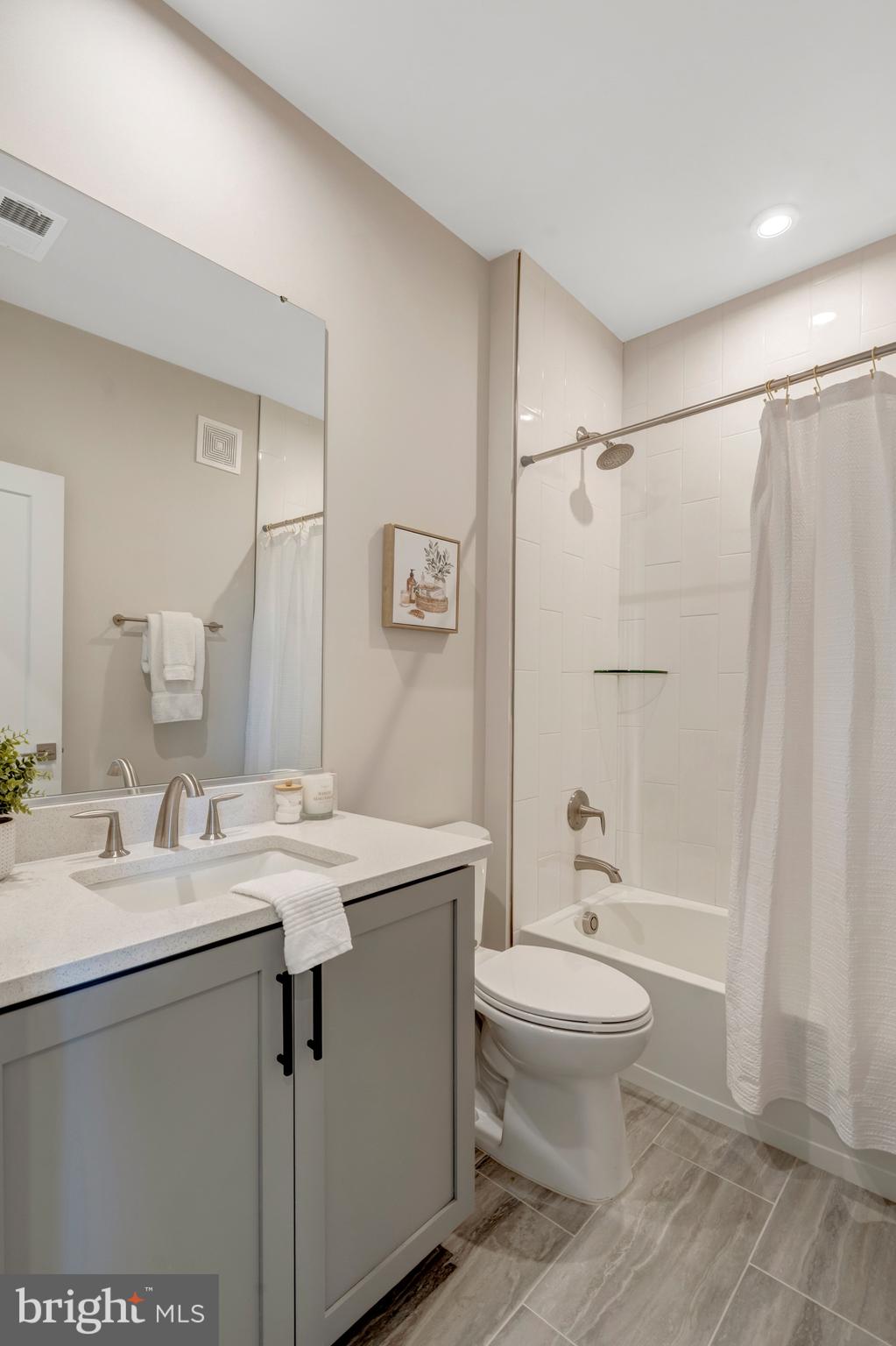 22379 Roanoke Rise Terrace Ashburn, VA 20148 - Photo 21 of 40 a bathroom with a sink a toilet and shower