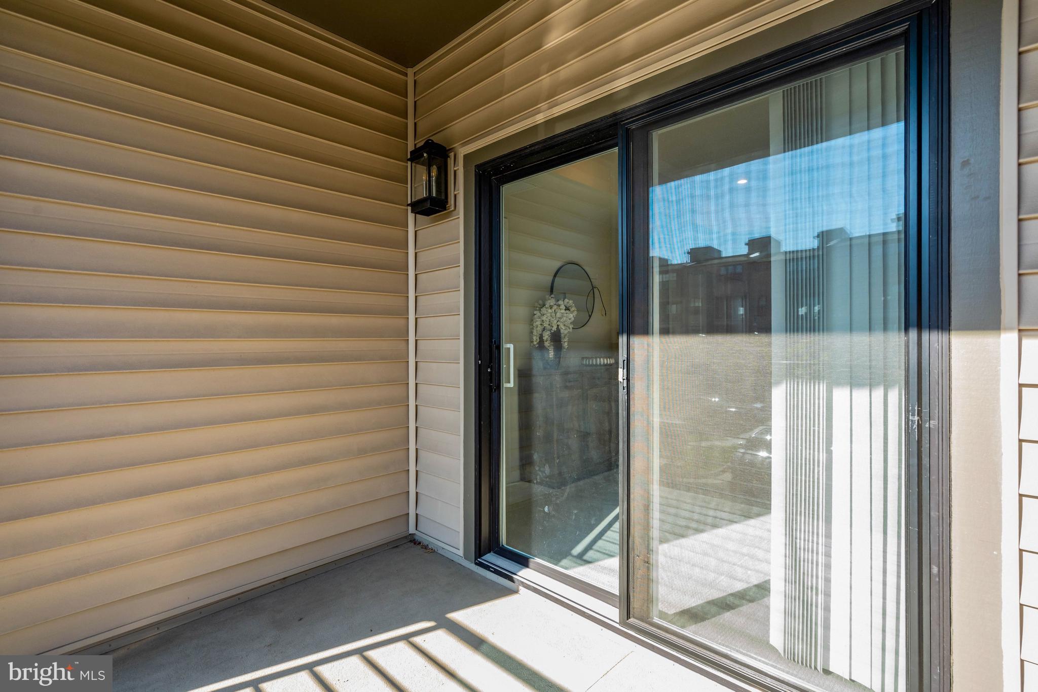 22379 Roanoke Rise Terrace Ashburn, VA 20148 - Photo 29 of 40 a view of a glass door with a glass door and a glass door