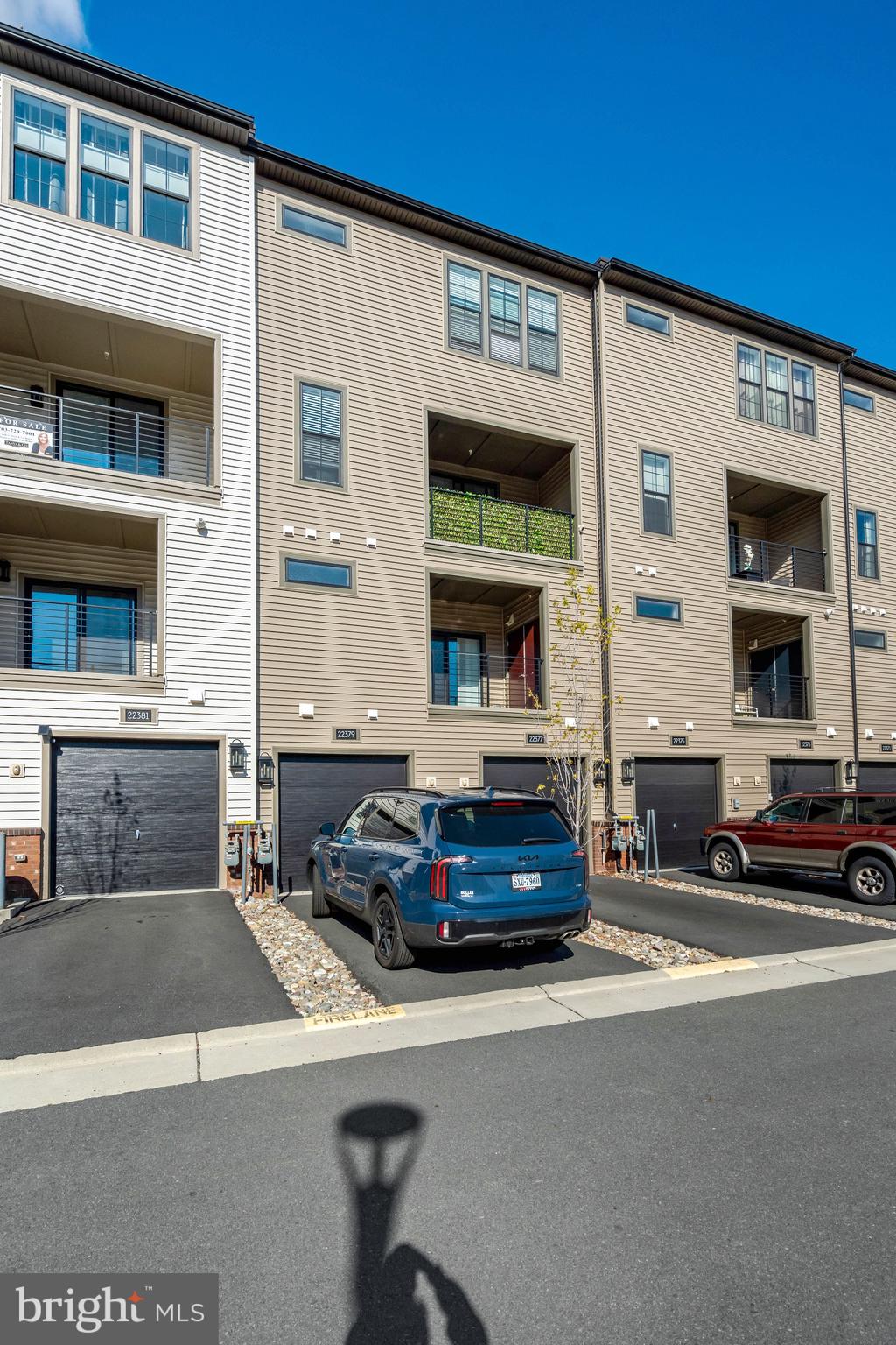 22379 Roanoke Rise Terrace Ashburn, VA 20148 - Photo 39 of 40 a car parked in front of a building
