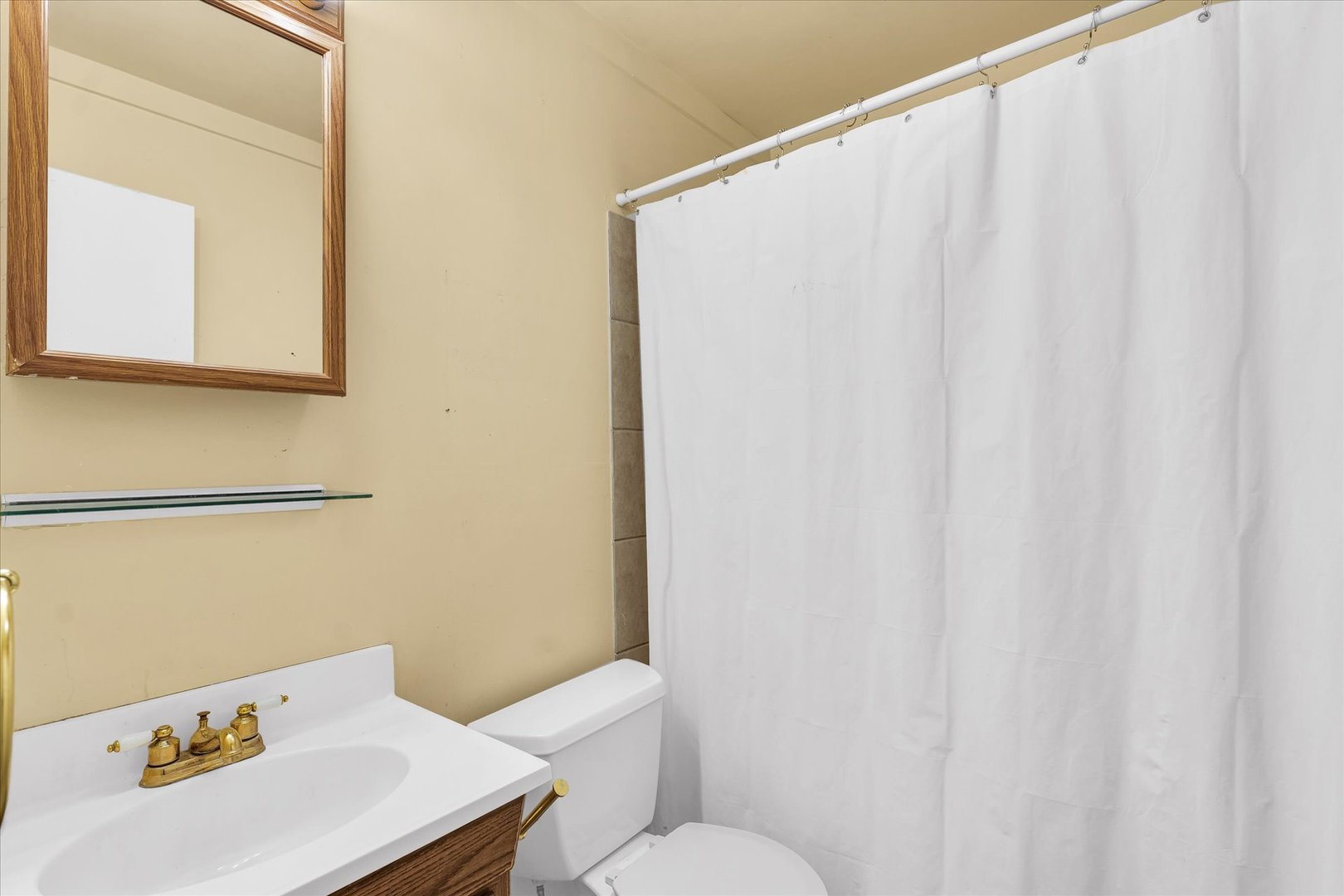 1710 Parkside Terrace Champaign, IL 61821 - Photo 23 of 31 a bathroom with a sink and a mirror