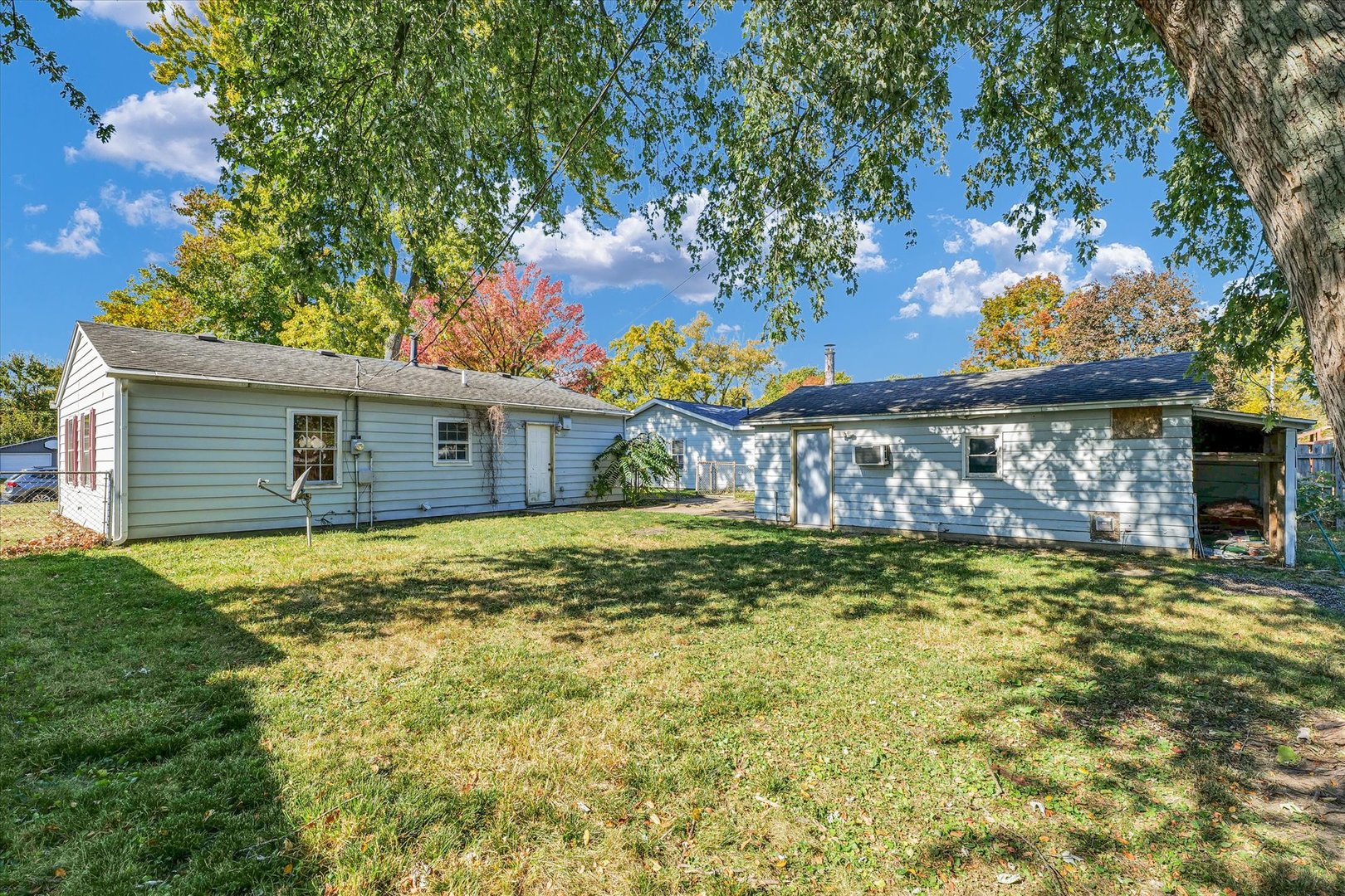 1710 Parkside Terrace Champaign, IL 61821 - Photo 26 of 31 a front view of a house with a yard