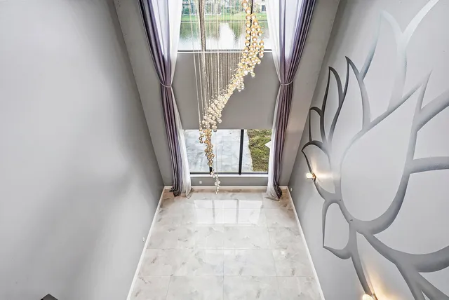 a view of a living room with a large window