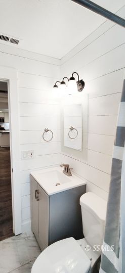 237 West Rader Avenue Ridgecrest, CA 93555 - Photo 18 of 37 a bathroom with a sink a toilet and shower
