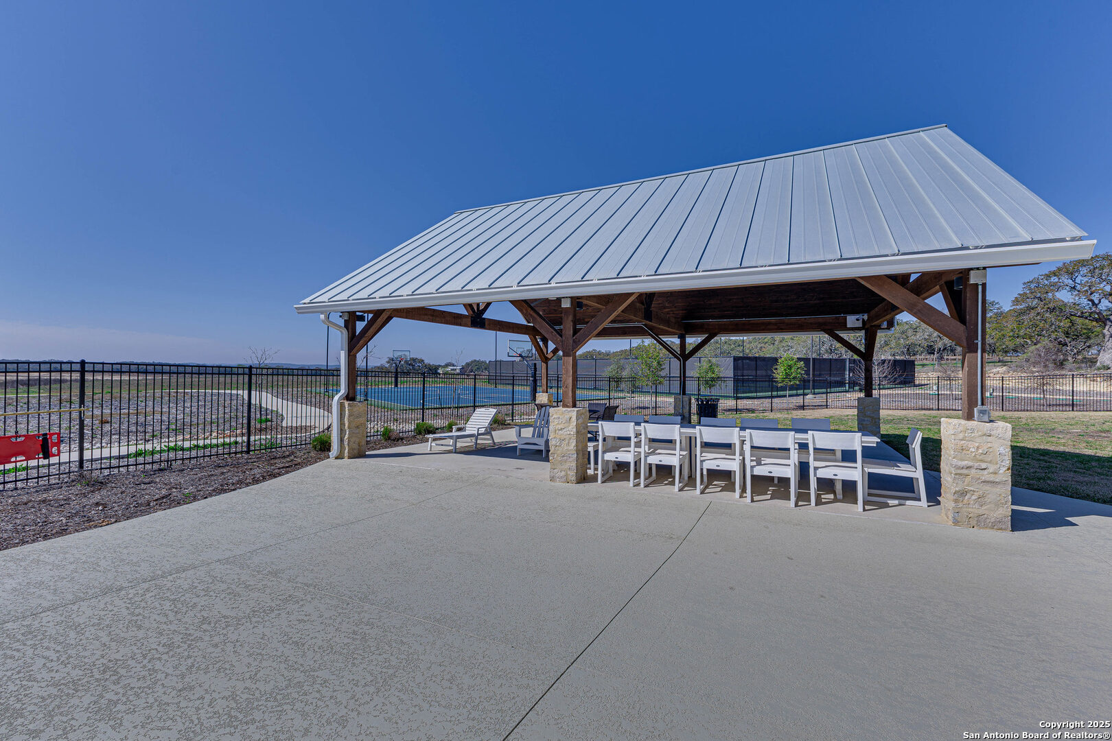 528 Rosemary Rdg Drive Bulverde, TX 78163 - Photo 25 of 44 an outdoor sitting area with a bed