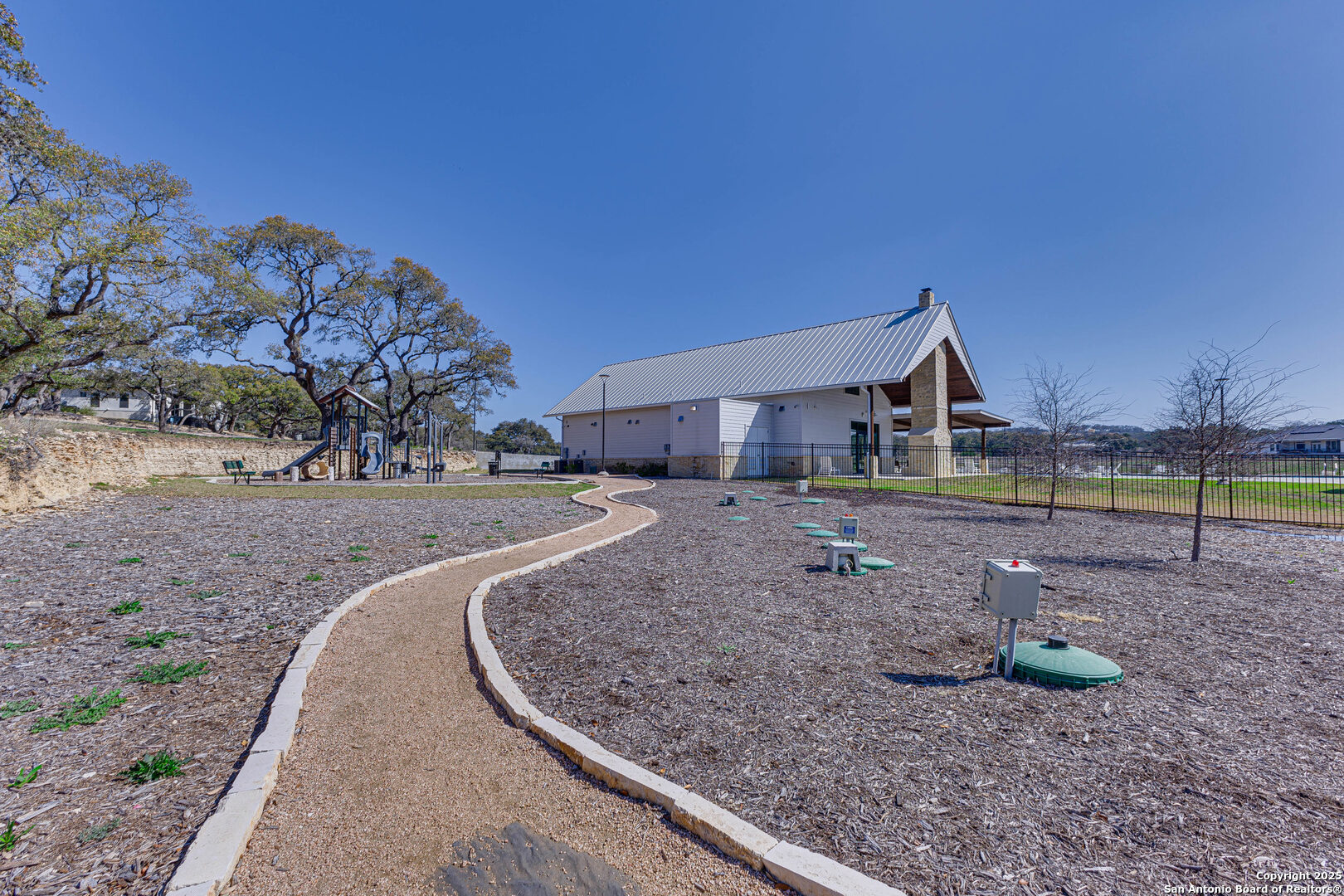 528 Rosemary Rdg Drive Bulverde, TX 78163 - Photo 30 of 44 a front view of a house with garden