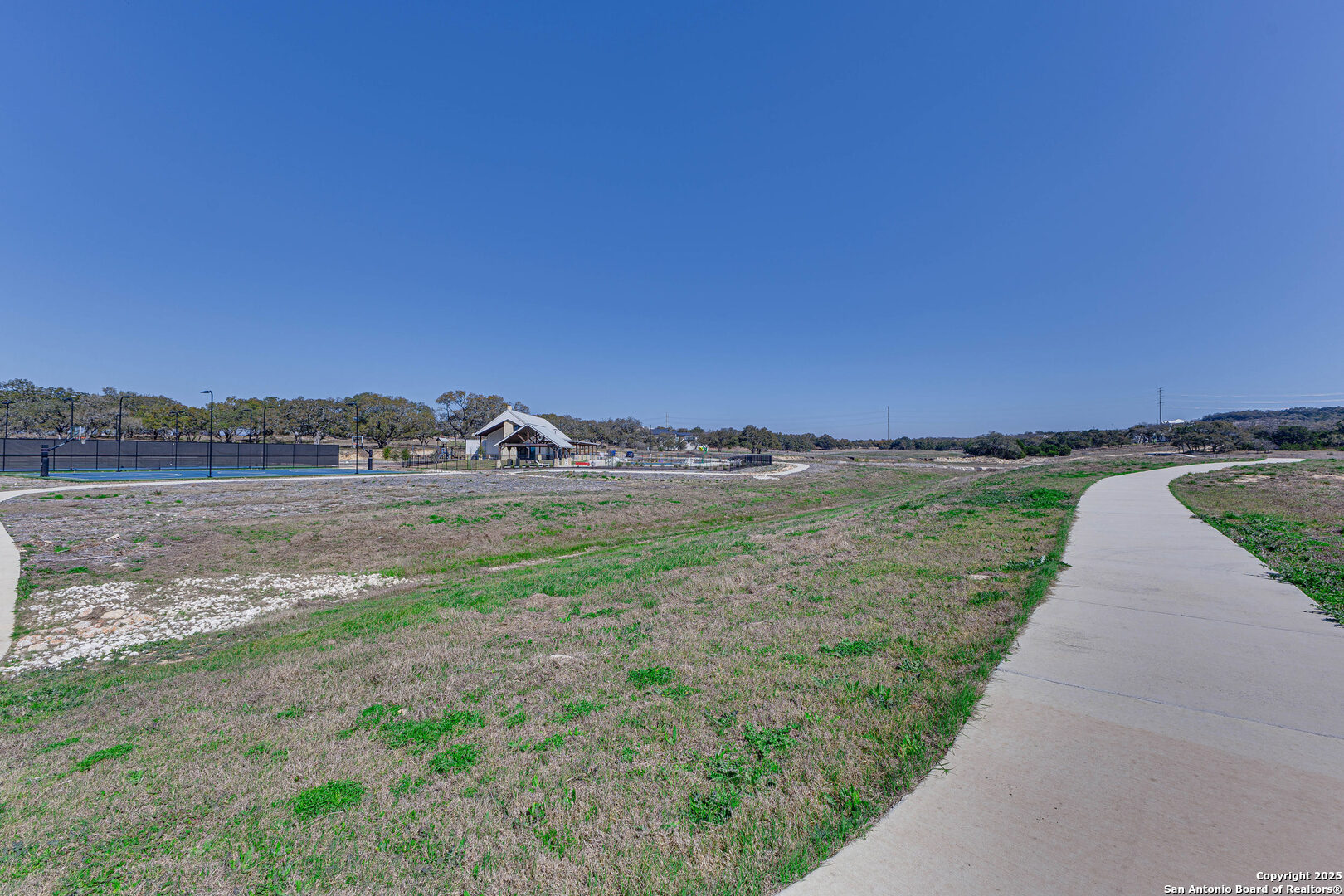 528 Rosemary Rdg Drive Bulverde, TX 78163 - Photo 42 of 44 a view of a lake with a big yard
