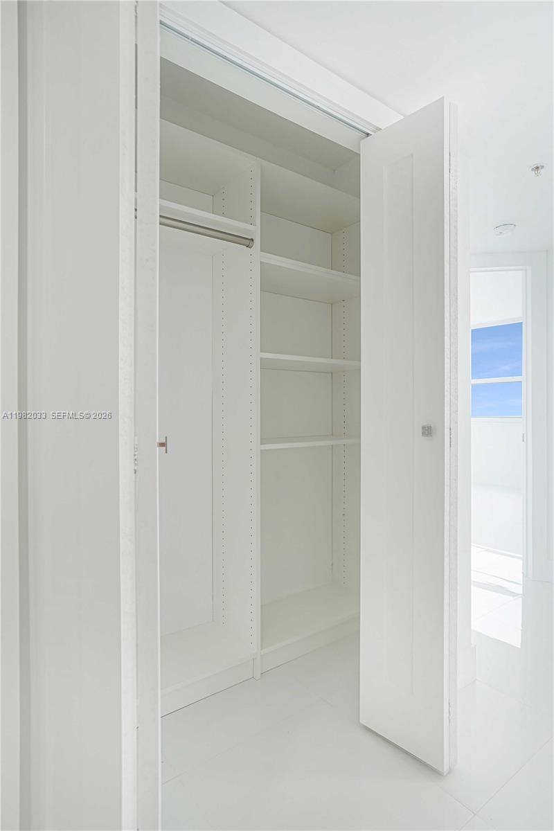 90 Alton Road, Unit 2212 Miami Beach, FL 33139 - Photo 13 of 42 Hallway closet