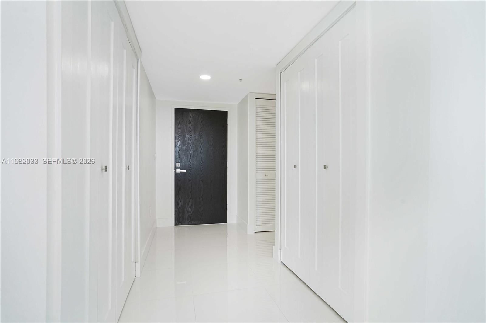 90 Alton Road, Unit 2212 Miami Beach, FL 33139 - Photo 14 of 42 Hallway with closets on both sides
