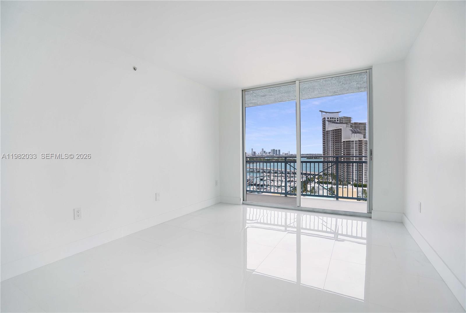90 Alton Road, Unit 2212 Miami Beach, FL 33139 - Photo 23 of 42 Master Bedroom with access to second balcony