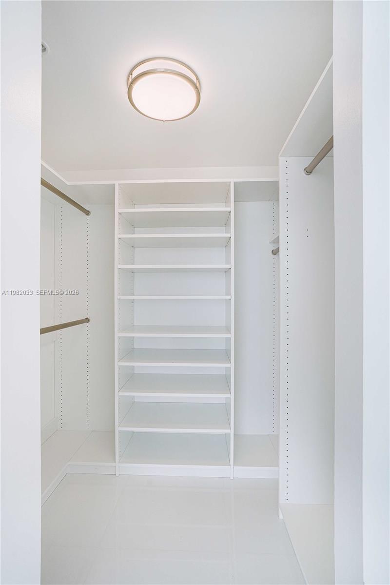 90 Alton Road, Unit 2212 Miami Beach, FL 33139 - Photo 26 of 42 Master Bedroom Walk in Closet