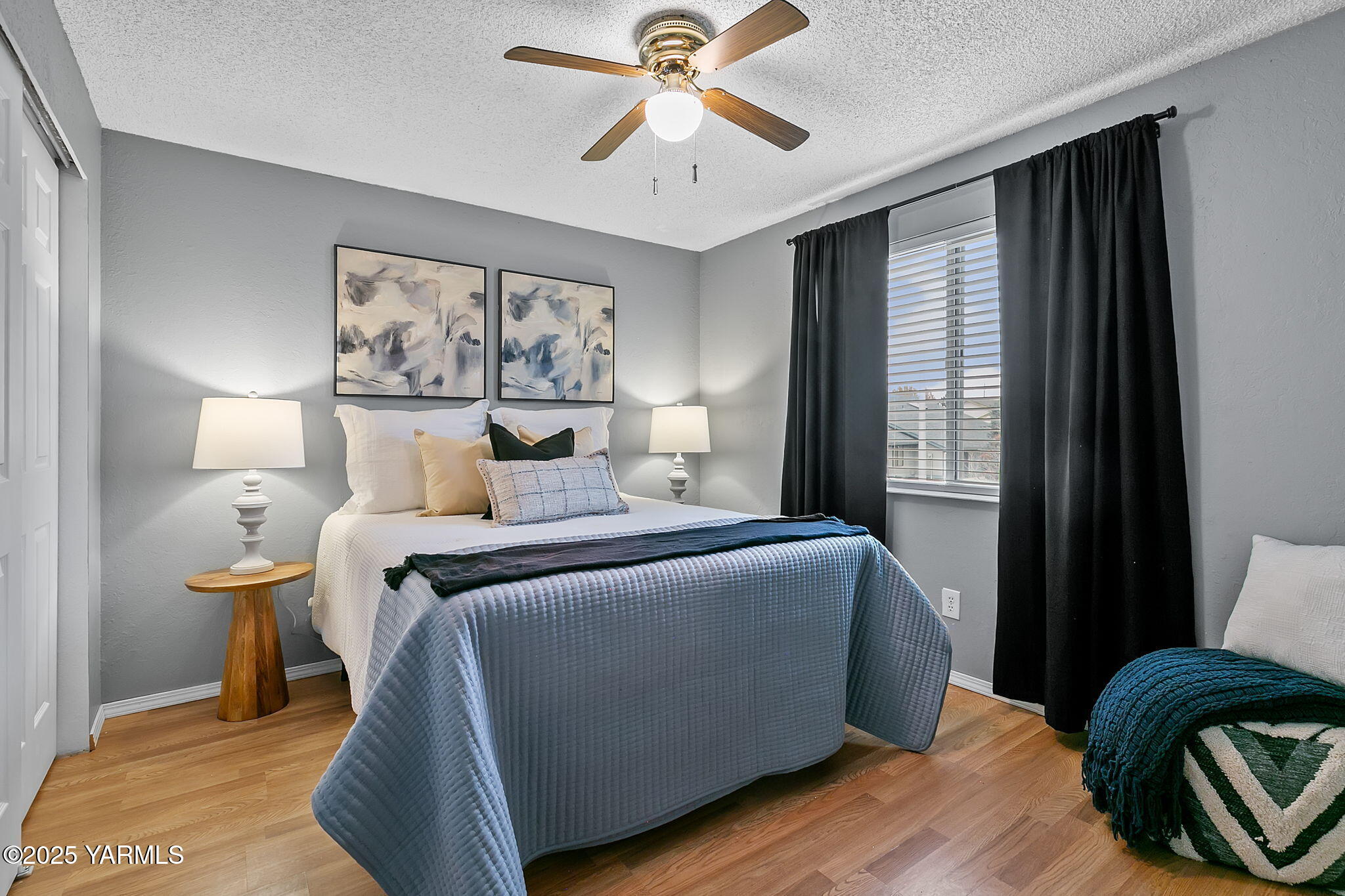 1106 South 33rd Avenue Yakima, WA 98902 - Photo 11 of 23 a bedroom with a bed and window