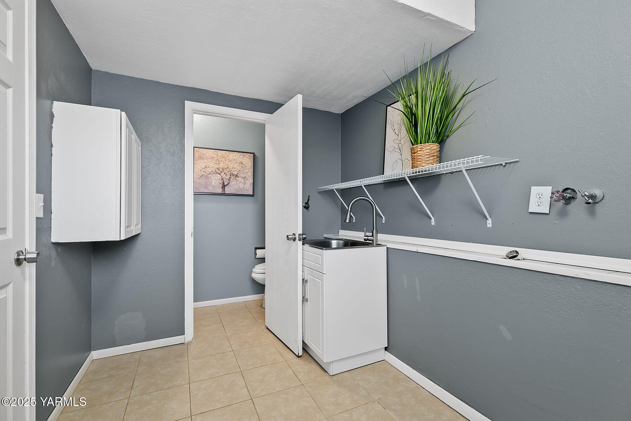 1106 South 33rd Avenue Yakima, WA 98902 - Photo 15 of 23 a room with storage and utility