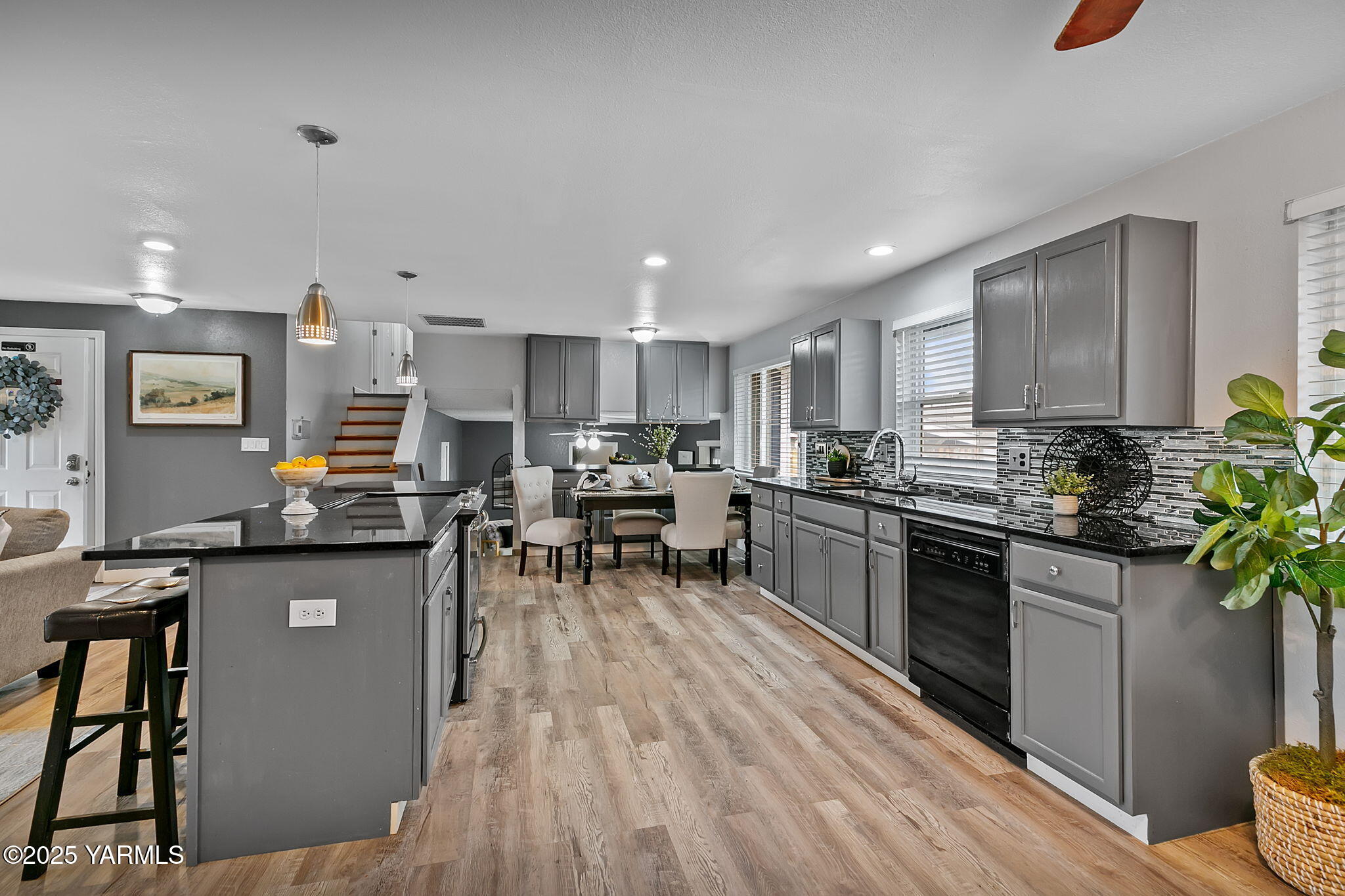 1106 South 33rd Avenue Yakima, WA 98902 - Photo 6 of 23 a kitchen with lots of counter top space and stainless steel appliances