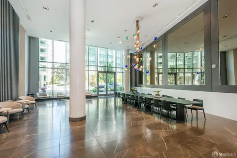 a view of a building with sitting area
