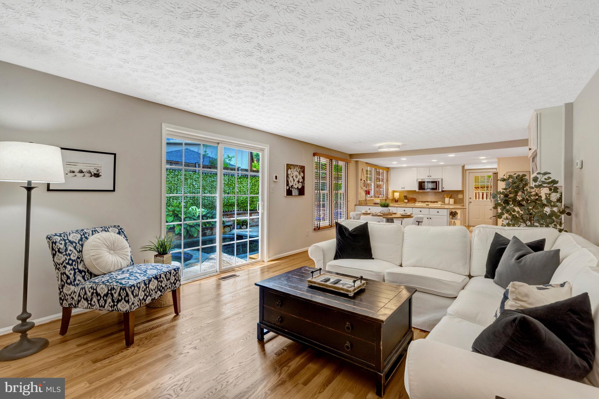 7809 Roundabout Way Springfield, VA 22153 - Photo 20 of 83 Family room meets poolside fun