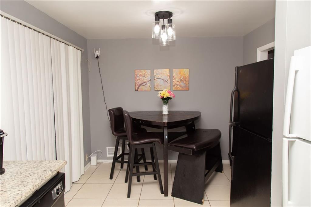 1681 Atherton Circle Decatur, GA 30035 - Photo 4 of 17 a dining room with furniture and window