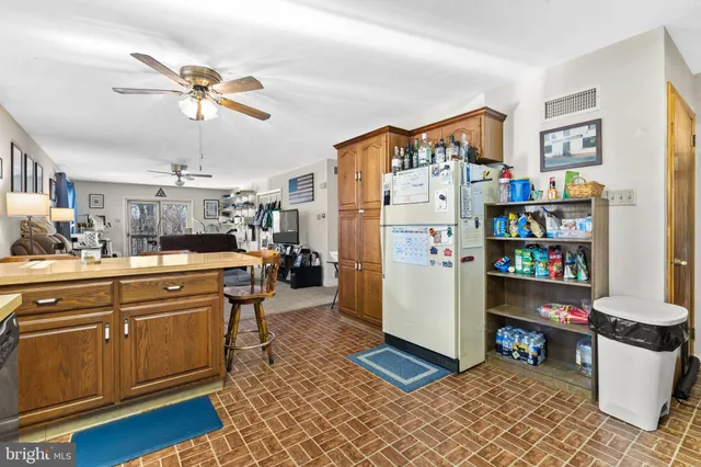 a workspace with furniture and a gate