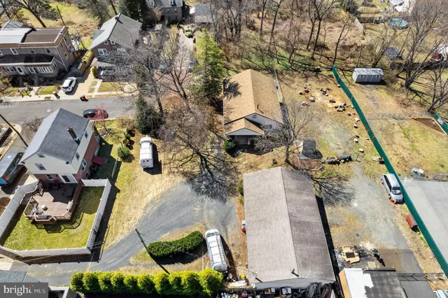 a kitchen with stainless steel appliances granite countertop a sink wooden cabinets and counter space