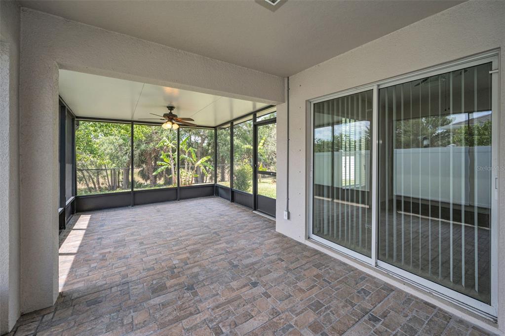 10106 Tolman Drive Hudson, FL 34667 - Photo 43 of 66 a view of a room with sliding glass door and balcony