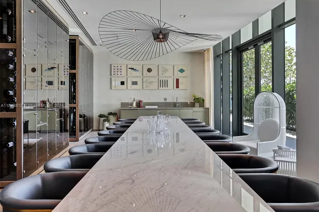 a white vase with flowers