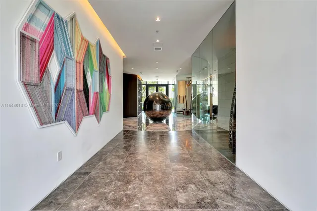 a view of a dining room with furniture and window
