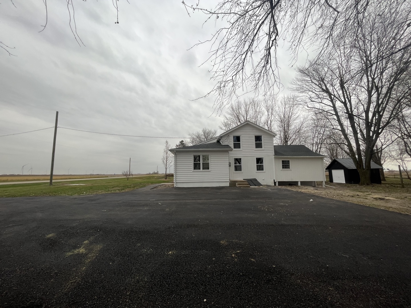 46 North 46th Road Mendota, IL 61342 - Photo 35 of 48 a white house that has a tree in front of it