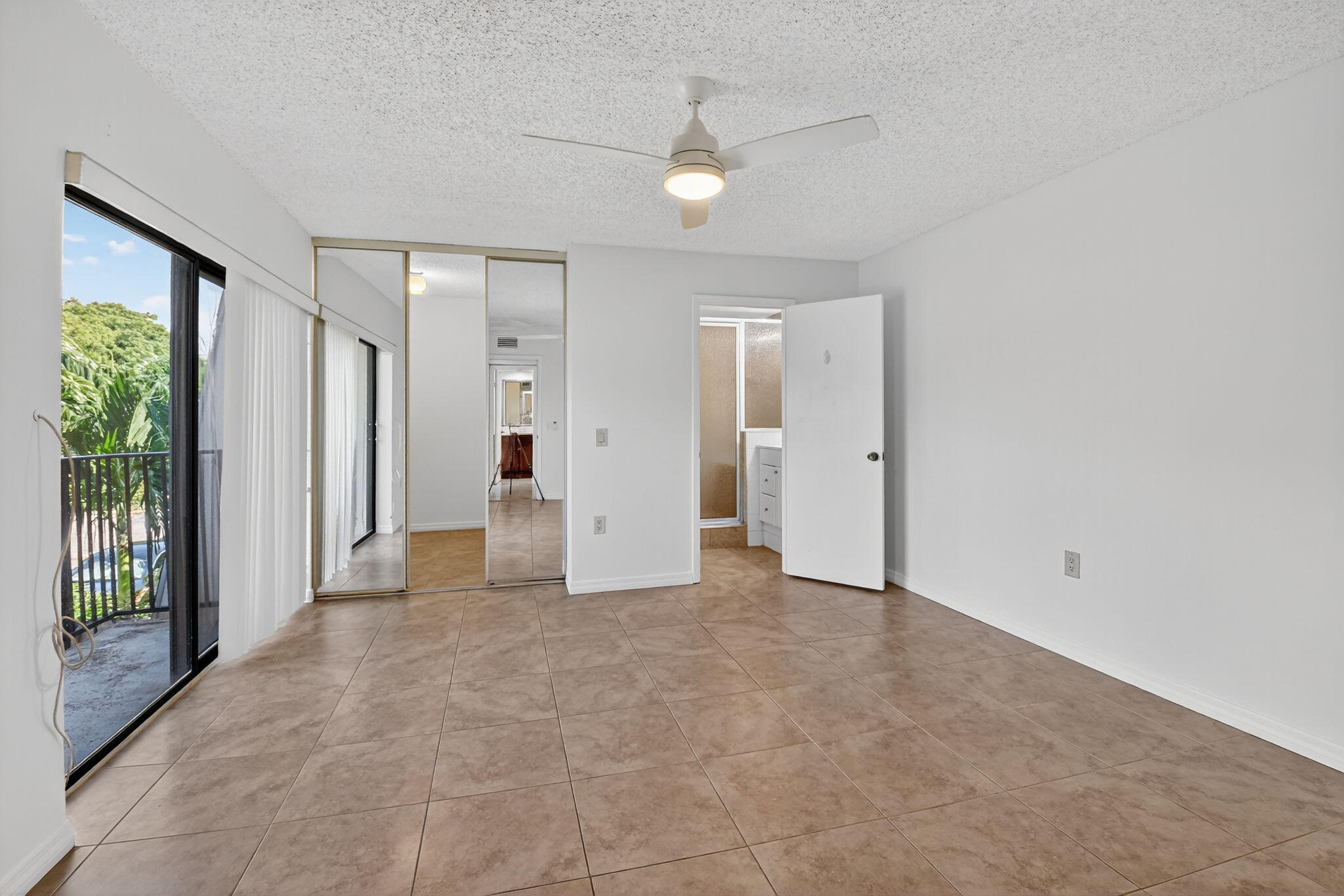 2907 Southwest 22nd Circle, Unit 39D Delray Beach, FL 33445 - Photo 17 of 57 an empty room with a bathroom and a shower