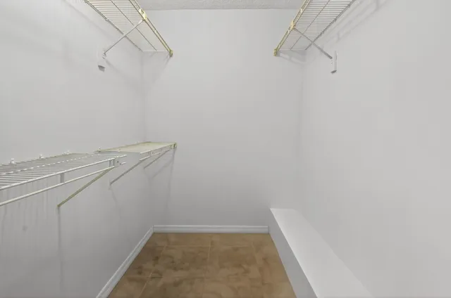 an empty room with a bathroom