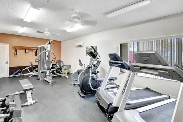 an aerial view of a houses with a lake view