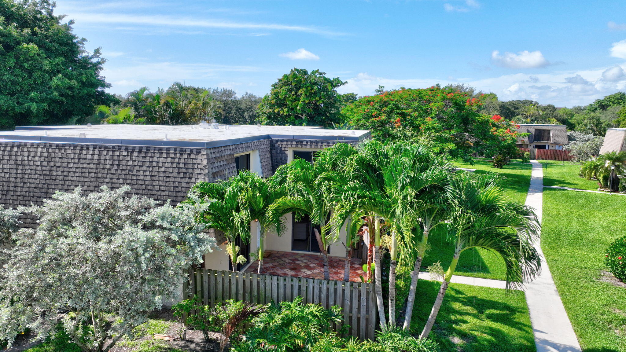 2907 Southwest 22nd Circle, Unit 39D Delray Beach, FL 33445 - Photo 50 of 57 a view of a garden