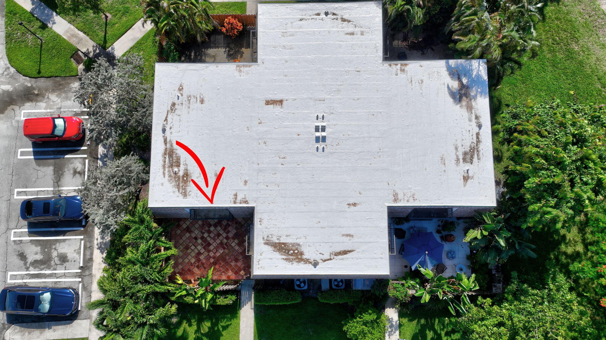 2907 Southwest 22nd Circle, Unit 39D Delray Beach, FL 33445 - Photo 52 of 57 an aerial view of a house with a yard and a fountain