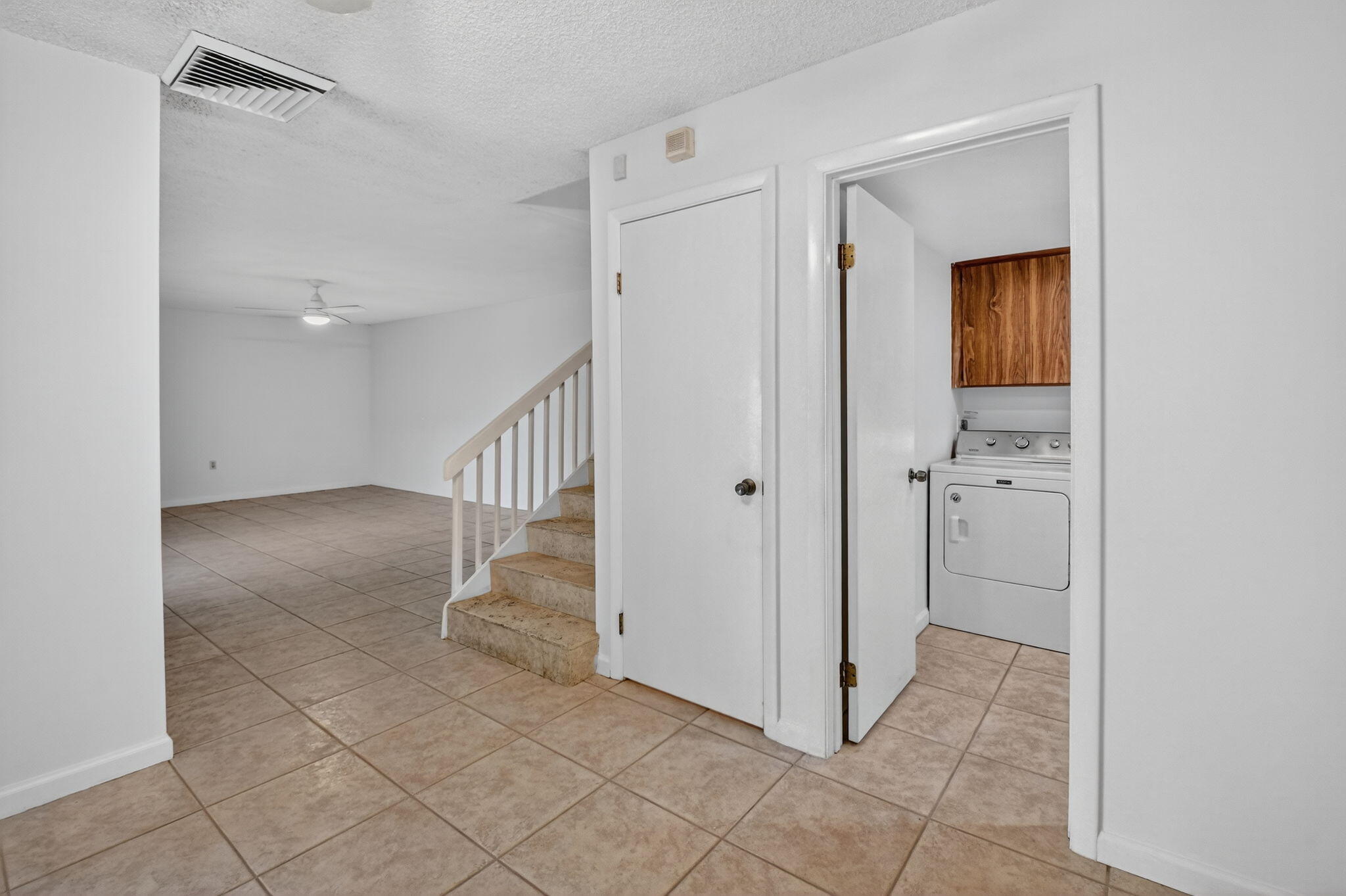 2907 Southwest 22nd Circle, Unit 39D Delray Beach, FL 33445 - Photo 10 of 57 a view of a hallway with closet and entryway