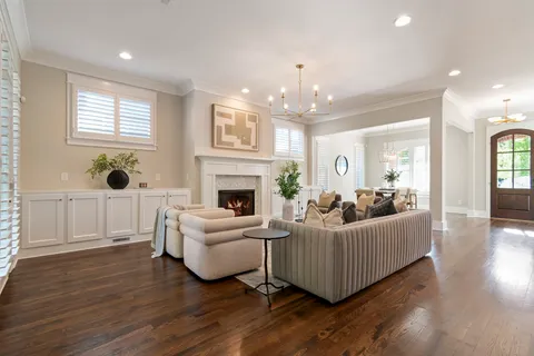 a view of a livingroom with furniture and windows