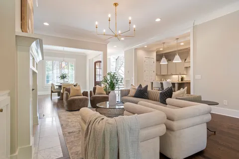 a kitchen with a sink a stove and refrigerator