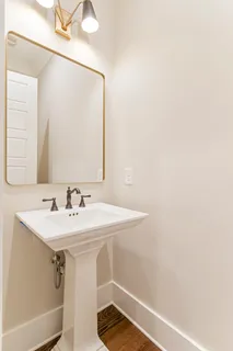 a spacious bedroom with a bed and a window