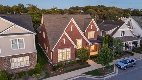 a view of a living room with a large window