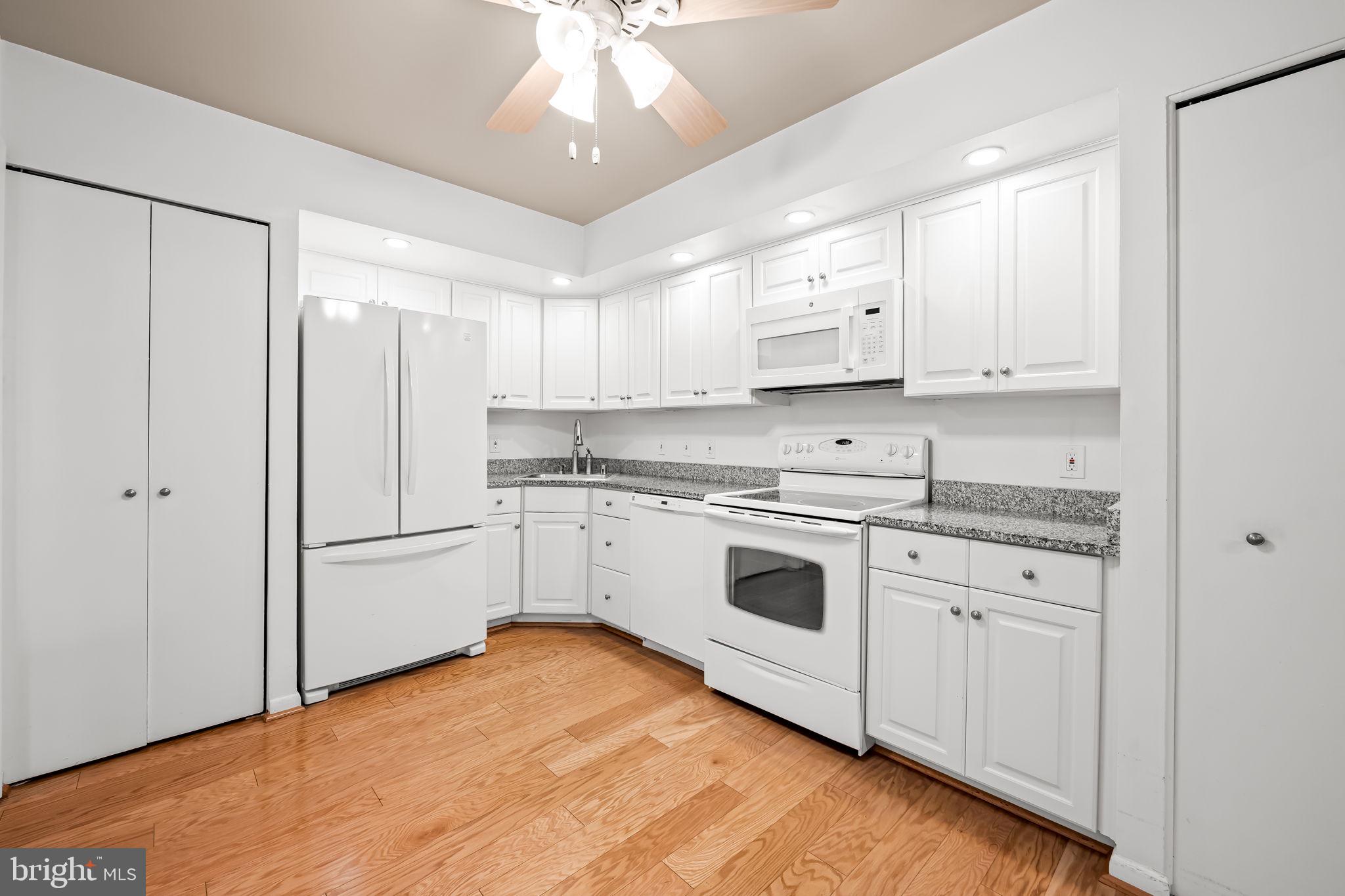 4 Candlemaker Court, Unit 306 Baltimore, MD 21208 - Photo 14 of 35 Immaculate white kitchen