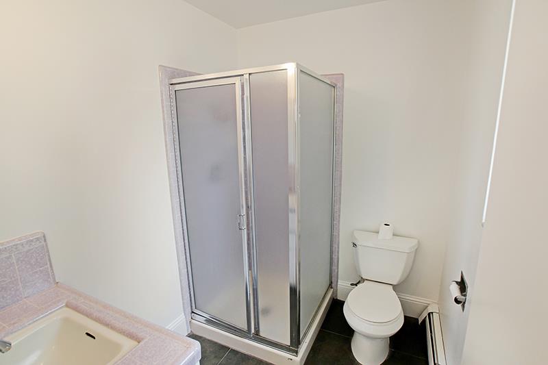 33 Langley Hill Road Woodside, CA 94062 - Photo 17 of 53 a white toilet sitting next to a shower