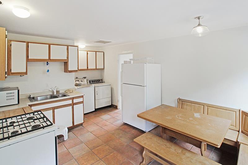 33 Langley Hill Road Woodside, CA 94062 - Photo 30 of 53 a kitchen with a stove a refrigerator and a sink