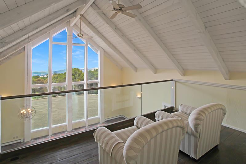 33 Langley Hill Road Woodside, CA 94062 - Photo 9 of 53 a view of a balcony with furniture and wooden floor