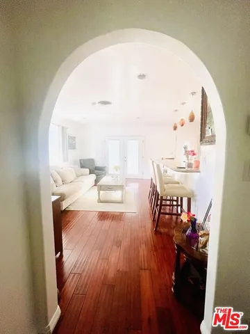 a bed room with a bed and a chair