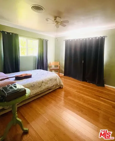 a bathroom with a sink a toilet and a shower