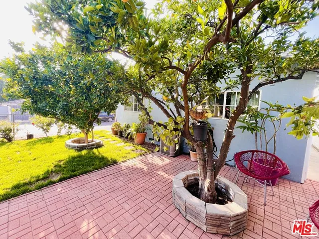 a bedroom with bed and a window