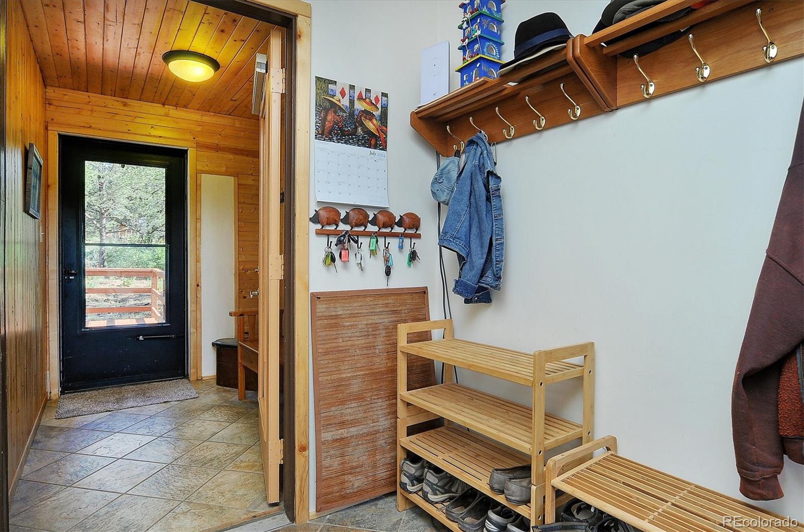 1111 Red Feather Road Cotopaxi, CO 81223 - Photo 12 of 37 a view of an entryway with a workspace