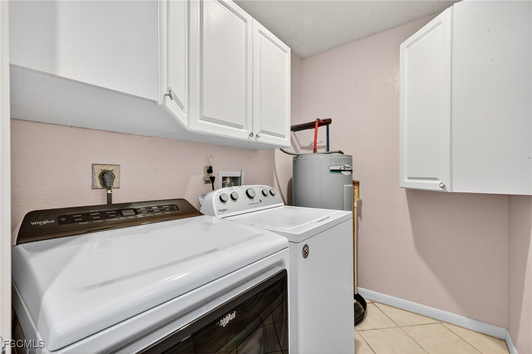 1414 Park Shore Circle, Unit 2 Fort Myers, FL 33901 - Photo 24 of 35 a utility room with dryer and washer