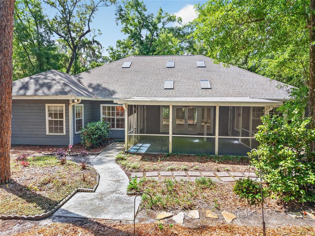 9626 Southwest 53rd Road Gainesville, FL 32608 - Photo 23 of 23 a house view with a sitting space