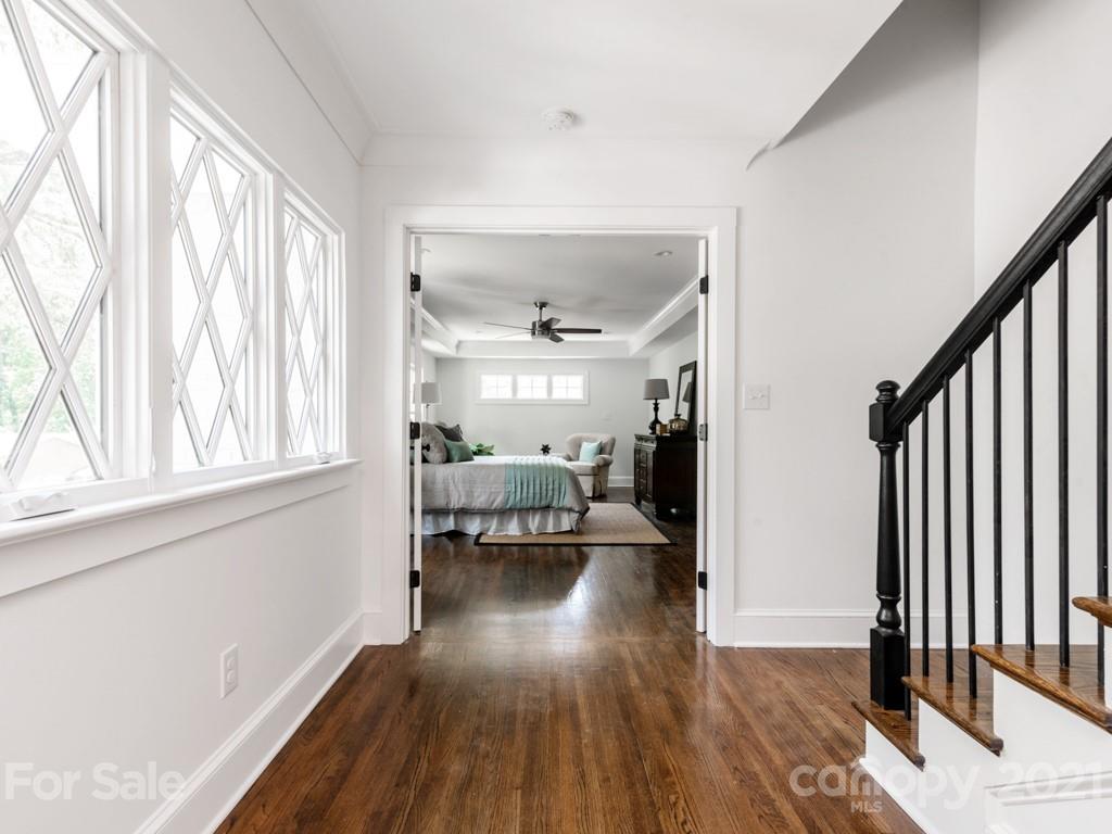 2248 Colony Road Charlotte, NC 28209 - Photo 12 of 27 a very nice looking room with wooden floor and a window